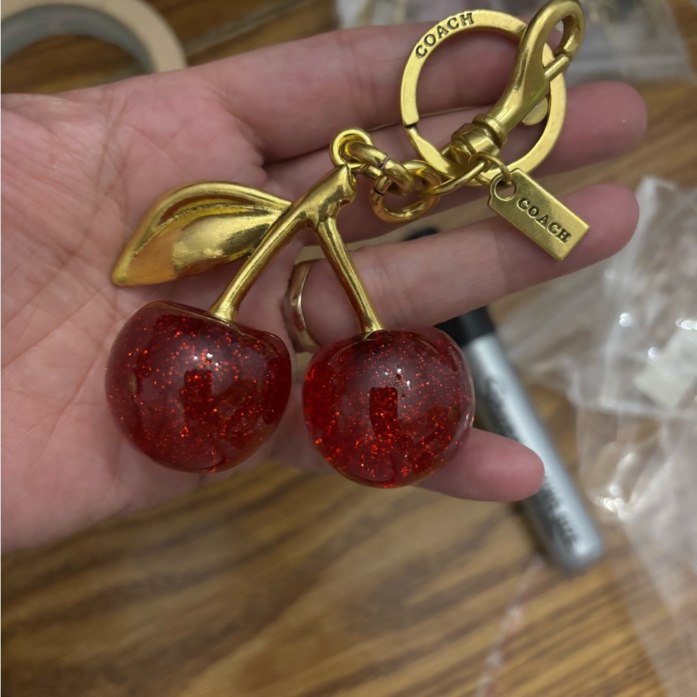Coach Red Cherry Keychain with Gold Details